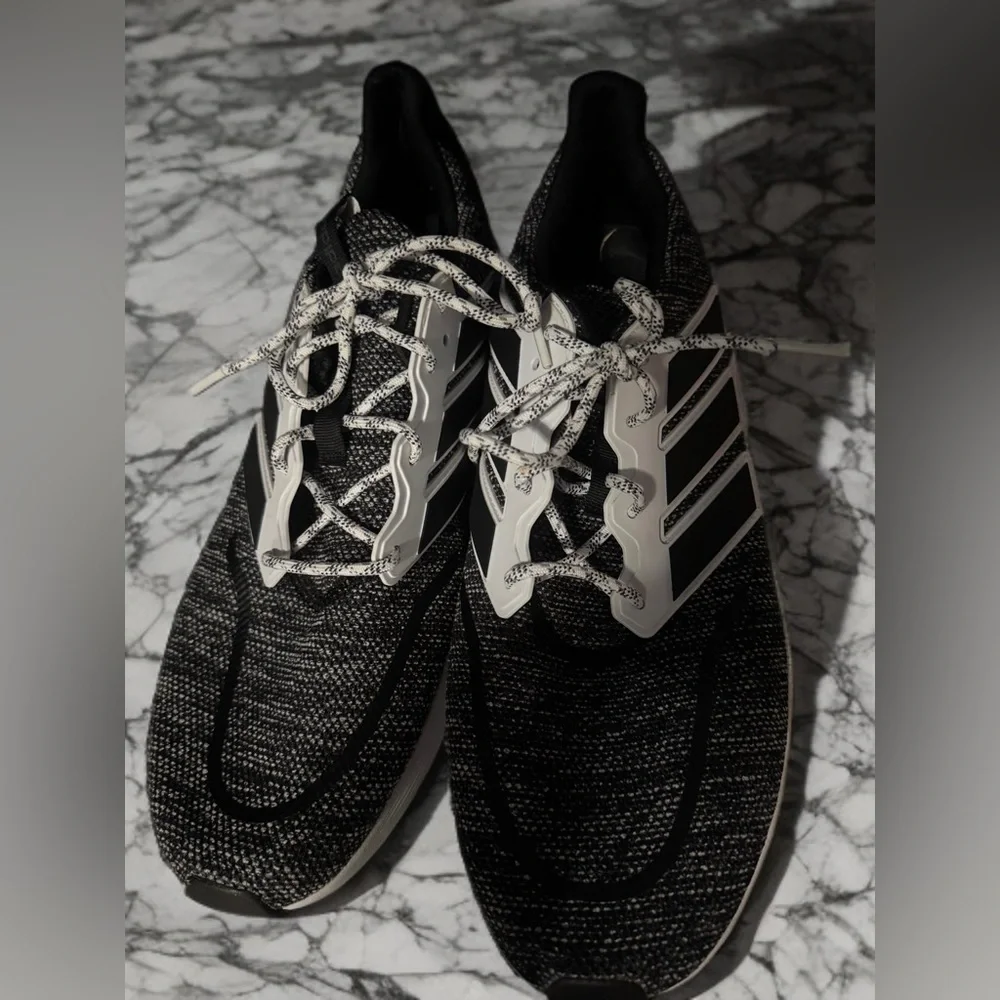 Adidas Black and White Sneakers with Sleek Design